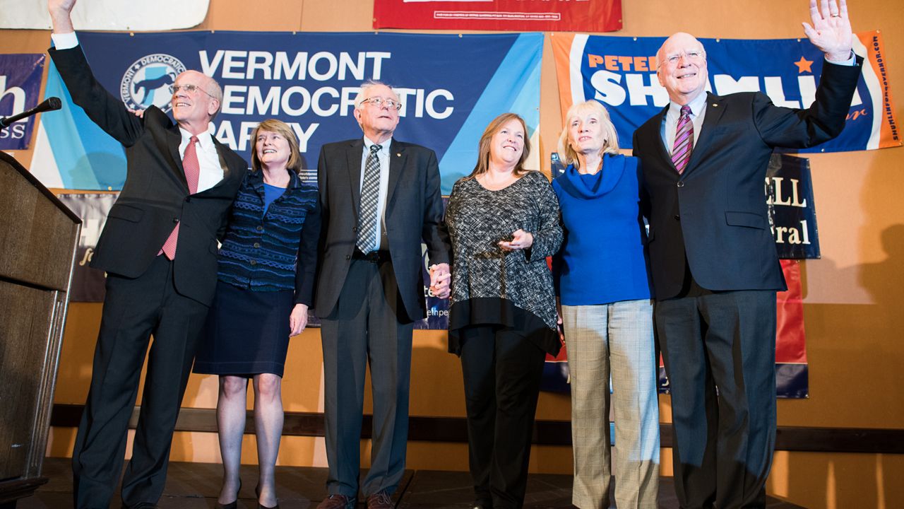 From left: Vermont incumbent U.S. Rep. Peter Welch, D-Vt., his wife Margaret Cheney, U.S. Sen. Bernie Sanders, I-Vt., his wife Jane Sanders, Marcelle Leahy, wife of Sen. Patrick Leahy, D-Vt., right, celebrate Rep. Welch's re-election on Tuesday, Nov. 4, 2014 in Burlington, Vt. (AP Photo/Andy Duback)