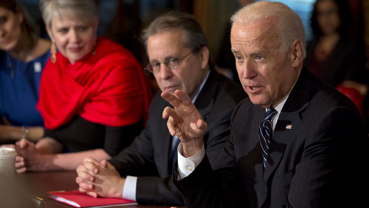 FILE PHOTO: Gene Sperling, Assistant to the President for Economic Policy and Director of National Economic Council, listens to Vice President Joe Biden during his meeting with CEO's in the Eisenhower Executive Office Building in Washington, Friday Jan. 31, 2014. (AP Photo/Jacquelyn Martin)