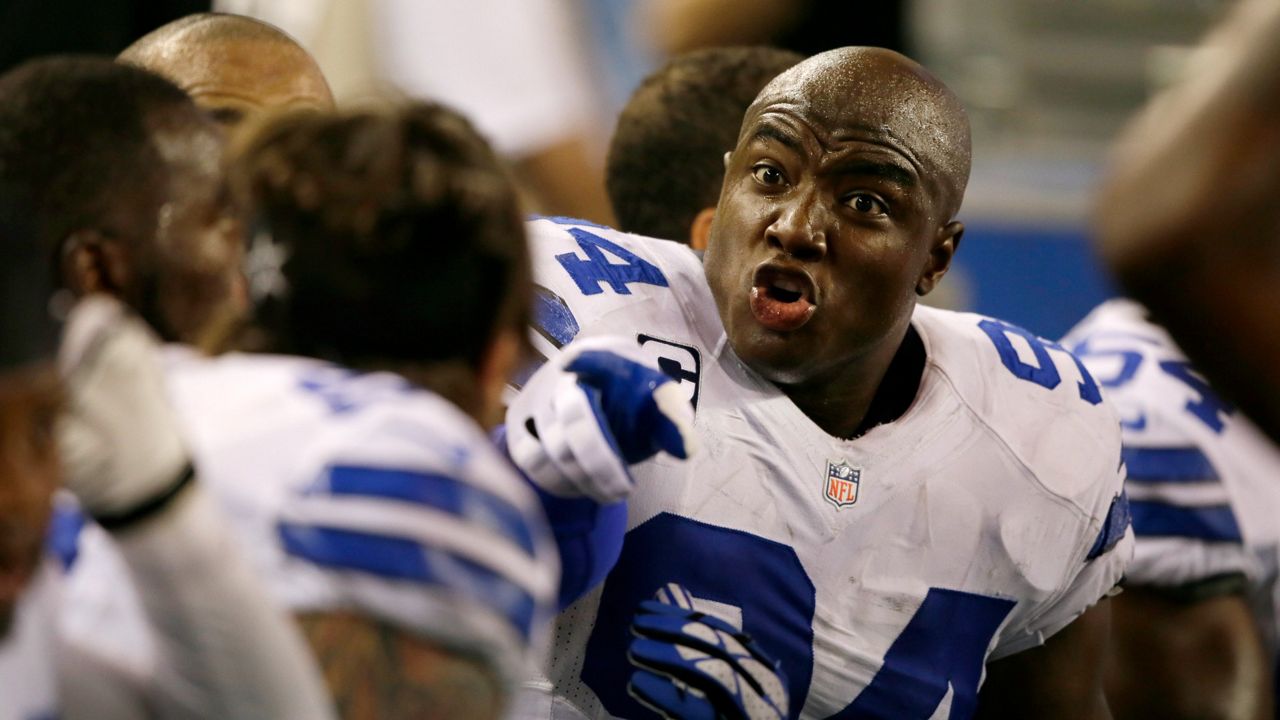 Dallas Cowboys' DeMarcus Ware (94) instructs teammates on the bench during an NFL football game against the New York Giants, Sunday, Sept. 8, 2013, in Arlington, Texas. (AP)