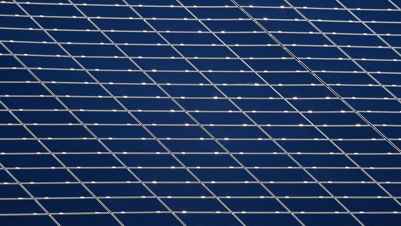 Solar panels are pictured in Moers, Germany, Tuesday, Jan. 28, 2014.(AP Photo/Frank Augstein)