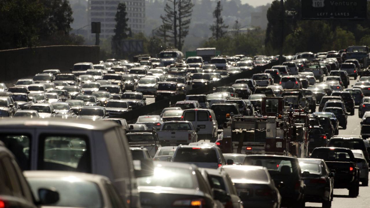 In this Wednesday, May 20, 2015 photo, traffic slowly moves along the 101 Freeway during afternoon rush hour in Los Angeles. (AP/Jae C. Hong)