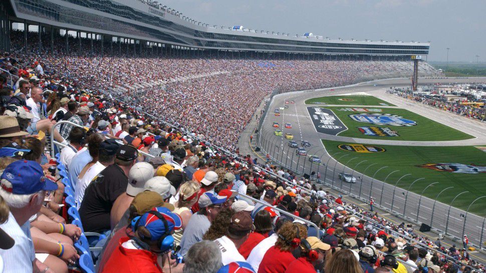 NASCAR fans watch first few laps of O'Reilly 300 BUSCH race, Texas Motor Speedway, Fort Worth. (Associated Press)