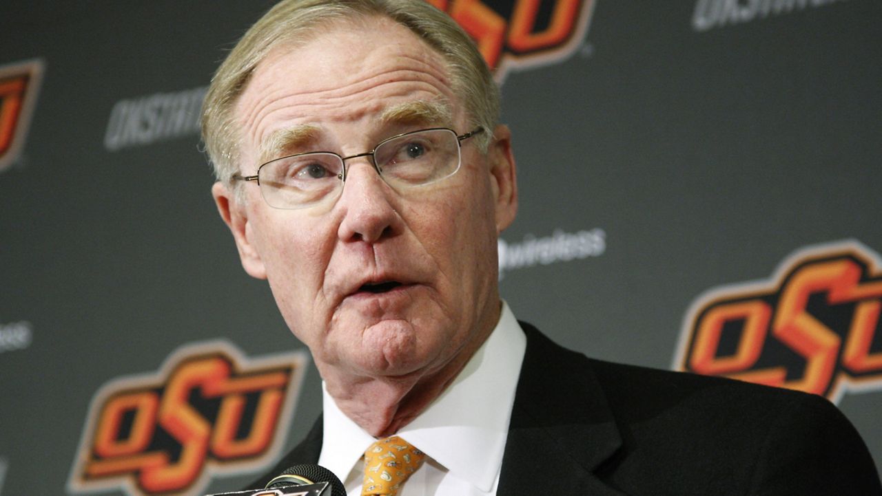 FILE - Oklahoma State University president Burns Hargis speaks during a news conference in Stillwater, Okla., Friday, Nov. 18, 2011. (AP Photo/Sue Ogrocki)