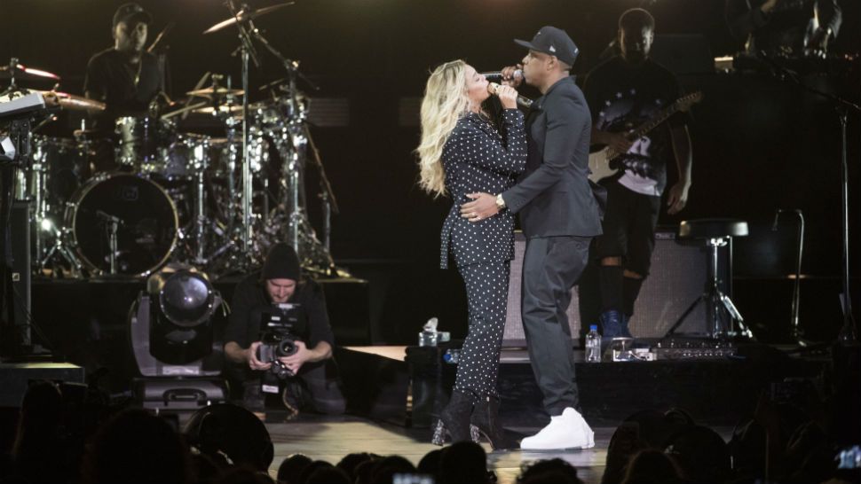 FILE - In this Friday, Nov. 4, 2016, file photo, Jay Z and Beyonce perform during a Democratic presidential candidate Hillary Clinton campaign rally in Cleveland. Country music power couple Faith Hill and Tim McGraw talk about what they admire about other musical couples, from Beyonce and Jay Z to Garth Brooks and Trisha Yearwood. “The truth is, I want to be Beyonce every single freaking night of my life,” Hill said. (AP Photo/Matt Rourke, File)