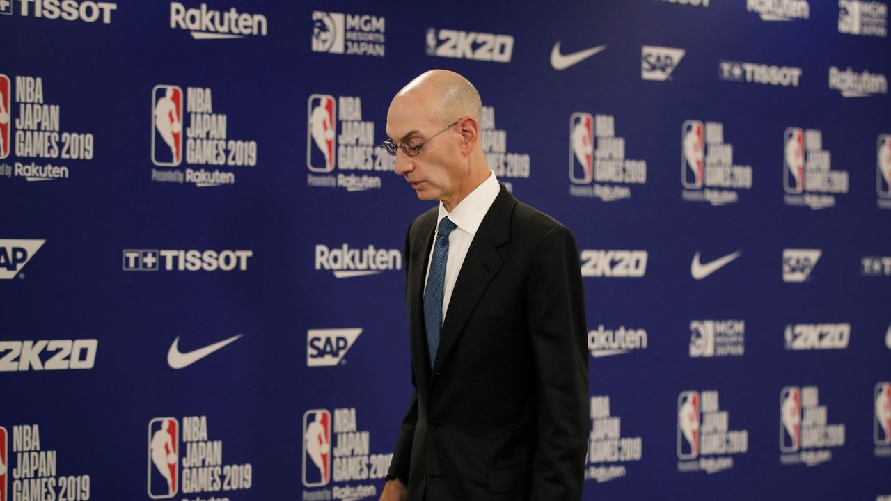 NBA Commissioner Adam Silver walks away from the podium after speaking at a news conference on Tuesday, Oct. 8, 2019 in Saitama.