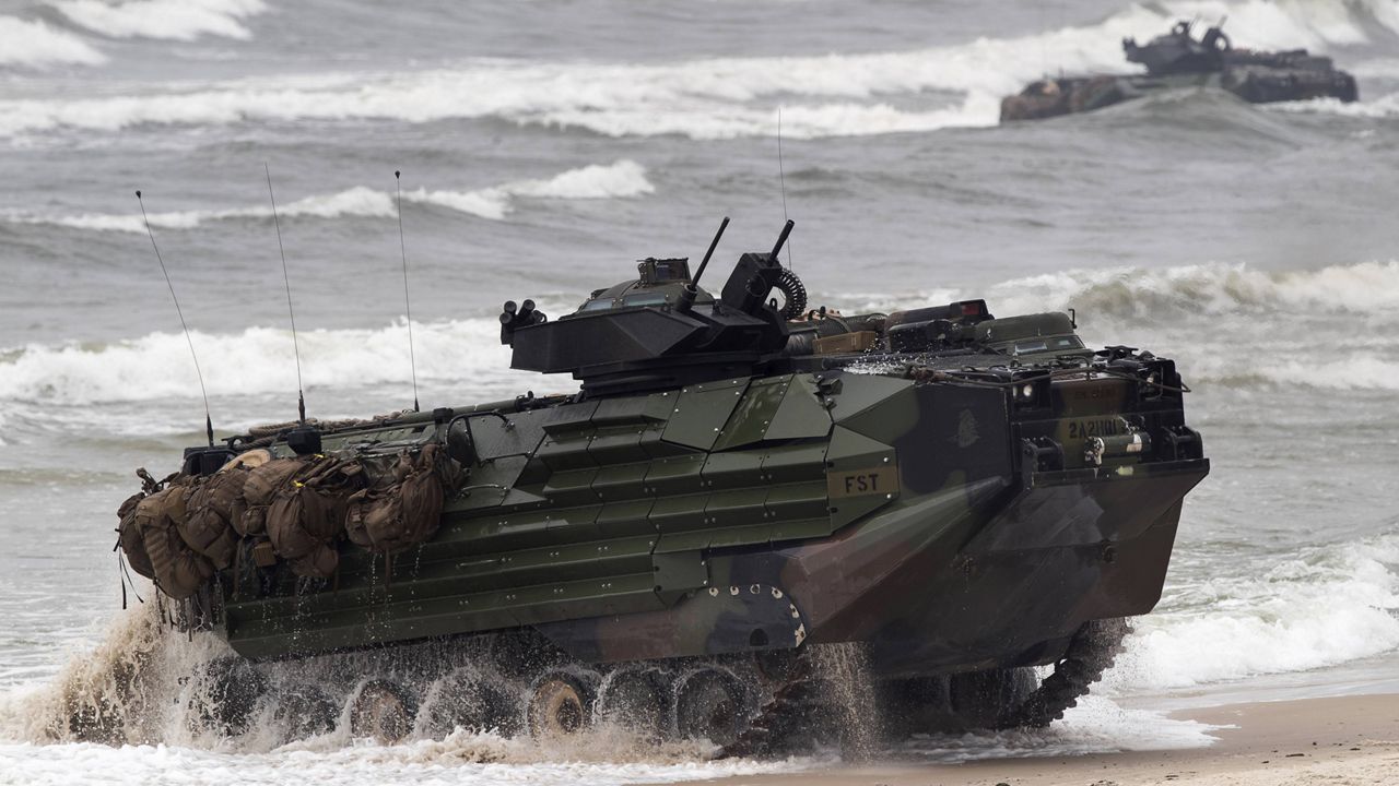 (AP Photo/Mindaugas Kulbis, File) FILE - A U.S. Marine Amphibious Assault Vehicle (AAV) takes part in a landing operation during a military Exercise Baltops 2018, at the Baltic Sea near Vilnius, Lithuania, Monday, June 4, 2018.
