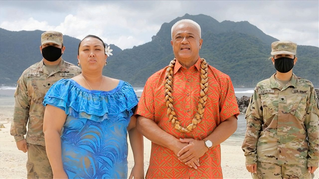 In this image from video, Aliitama Sotoa and Petti Matila of American Samoa speak during the state roll call vote on second night of the Democratic National Convention on Tuesday, Aug. 18, 2020.