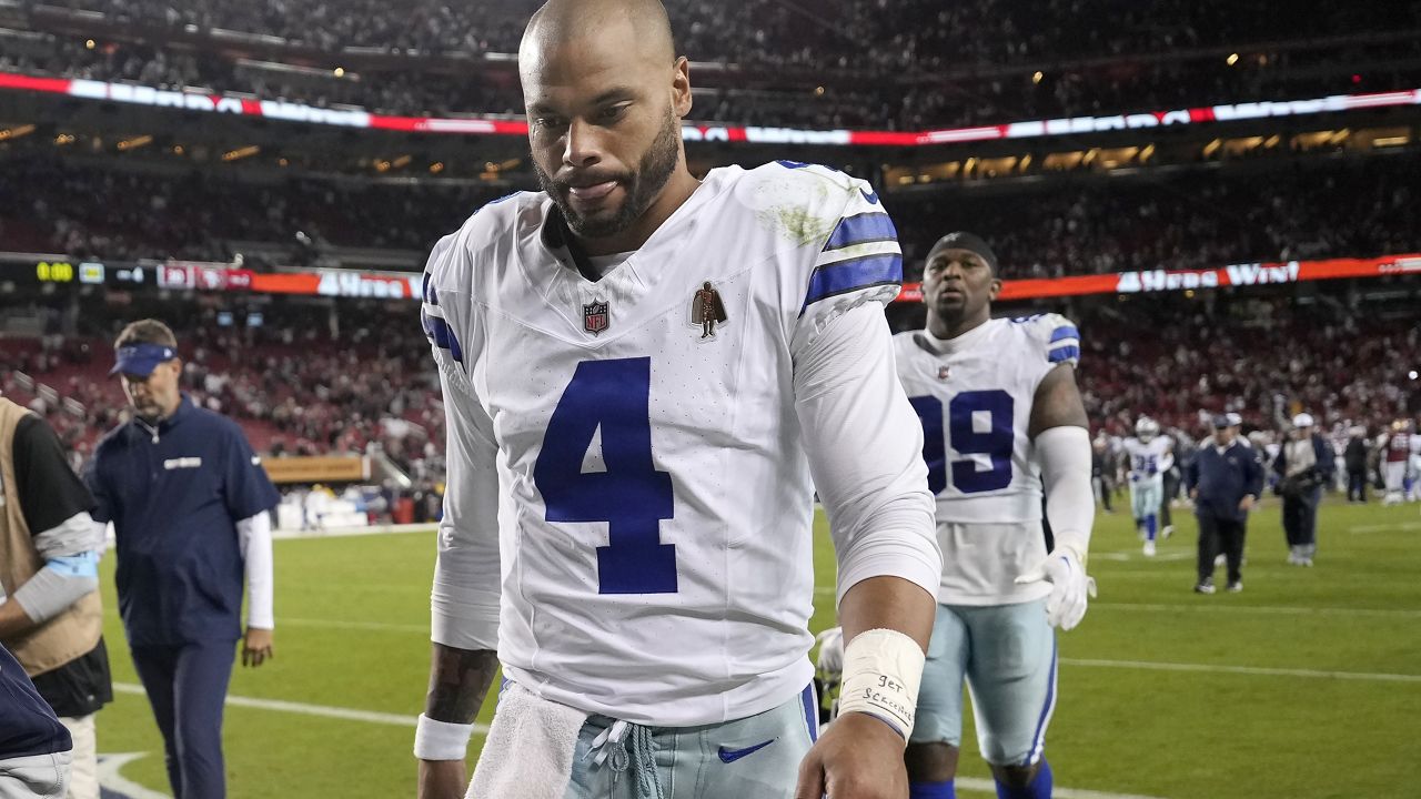 Dallas Cowboys quarterback Dak Prescott (4) walks off the field after an NFL football game against the San Francisco 49ers in Santa Clara, Calif., Sunday, Oct. 27, 2024. (AP Photo/Tony Avelar)