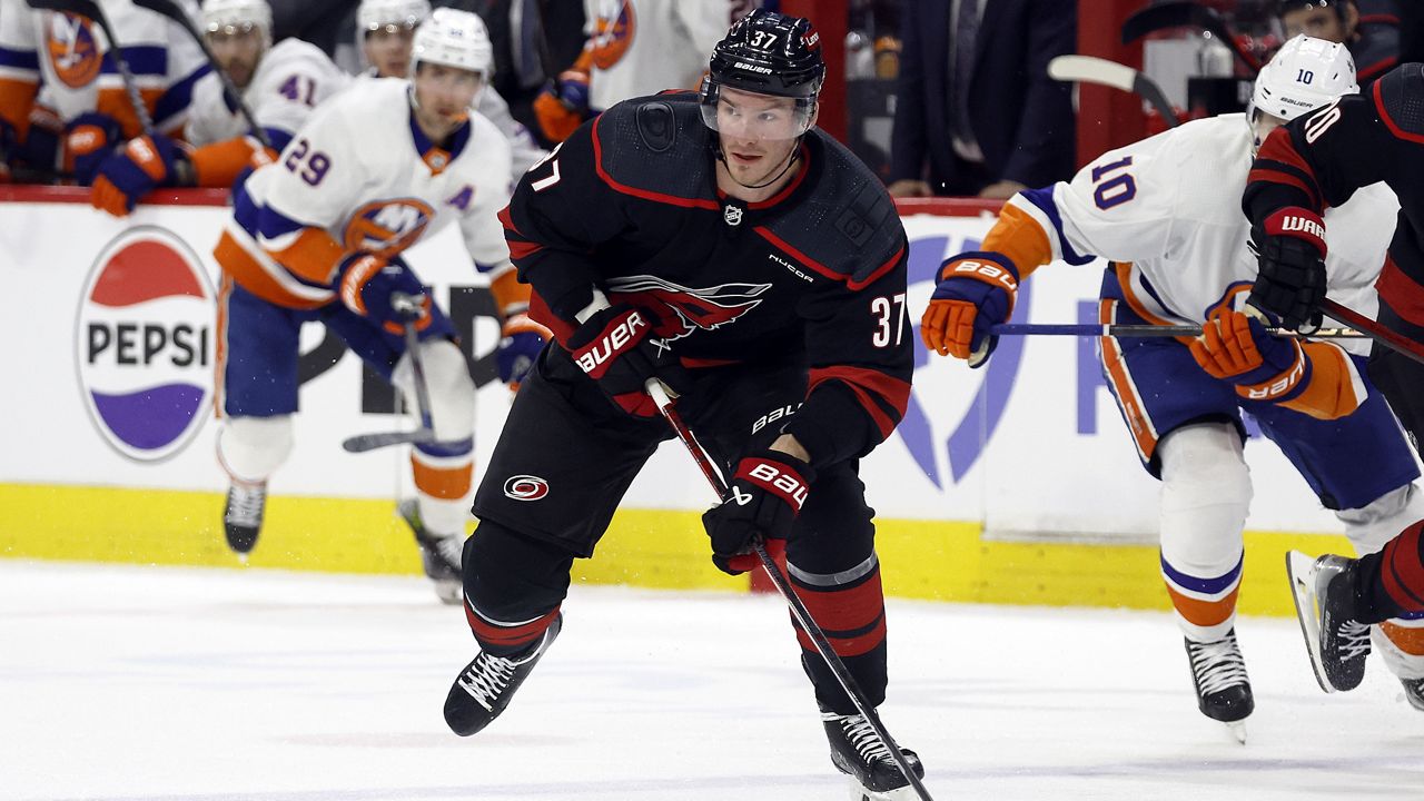 Carolina Hurricanes' Andrei Svechnikov (37) controls the puck against the New York Islanders during the second period in Game 5 of an NHL hockey Stanley Cup first-round playoff series in Raleigh, N.C., Tuesday, April 30, 2024. (AP Photo/Karl B DeBlaker)