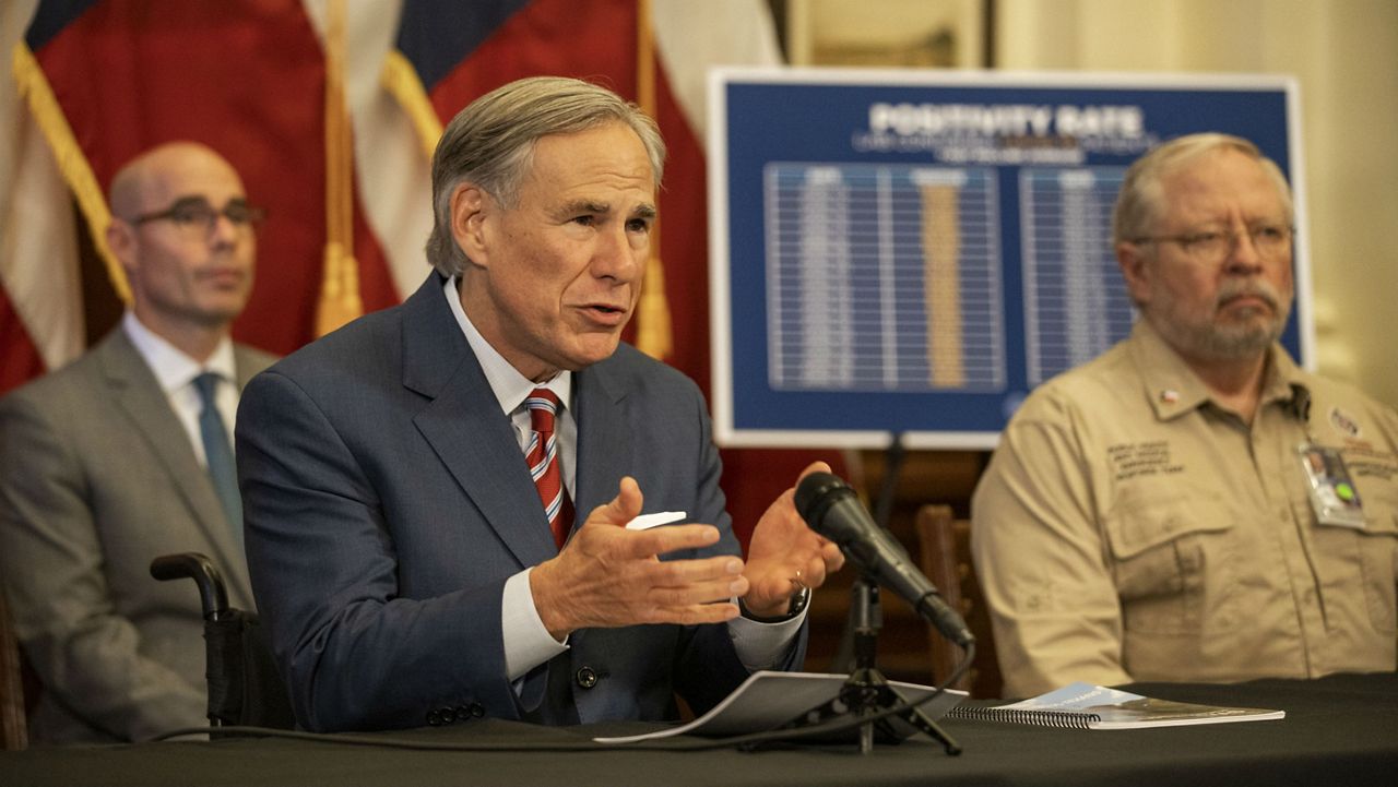 Texas Gov. Greg Abbott announces the reopening of more Texas businesses during the COVID-19 pandemic at a press conference at the Texas State Capitol in Austin on Monday, May 18, 2020. (Lynda M. Gonzalez/The Dallas Morning News via AP, Pool)