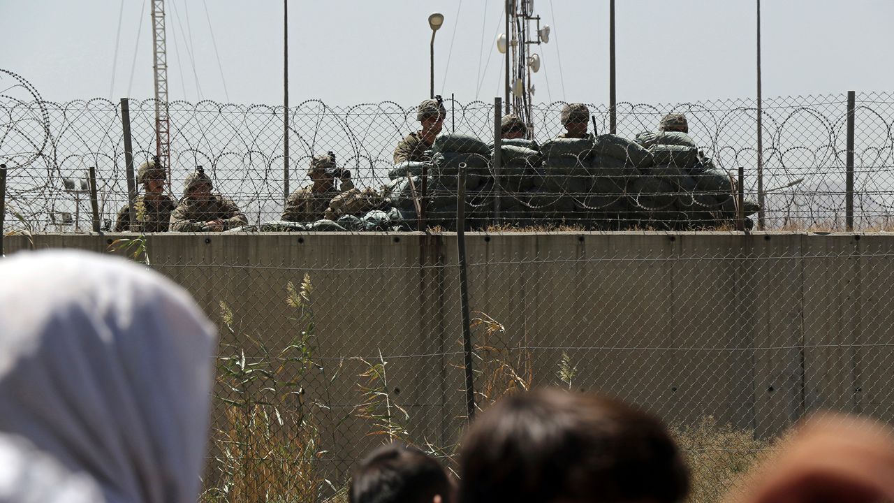 Photo of U.S. troops controlling evacuations in Kabul, Afghanistan.