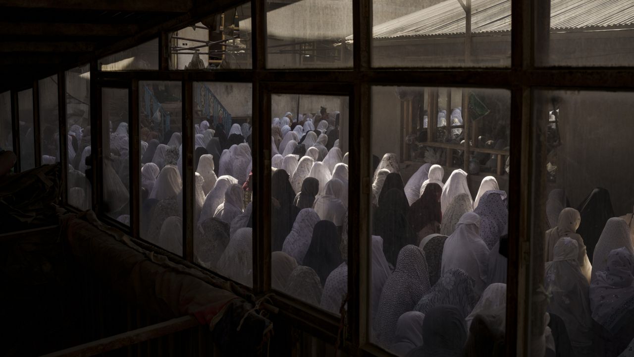 FILE - Women pray in a Shiite mosque during Friday prayers in Kabul, Afghanistan, Friday, Oct. 8, 2021. (AP Photo/Felipe Dana, File)