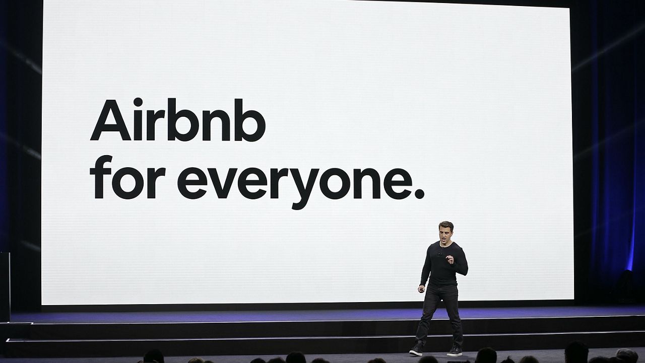 FILE - In this Feb. 22, 2018 file photo, Airbnb co-founder and CEO Brian Chesky speaks during an event in San Francisco. (AP Photo/Eric Risberg, File)