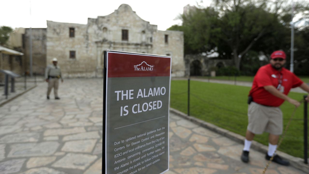 An image of "The Alamo is Closed" sign (AP Image/File)