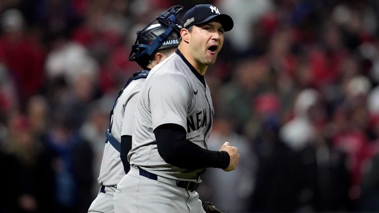 A photo of Tommy Kahnle of the Yankees after the final out.