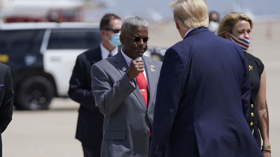 Texas Republican Party Chairman Allen West, seen here greeting former president Donald Trump, urged lawmakers to "not concern themselves with fairness" in redrawing the districts. 
