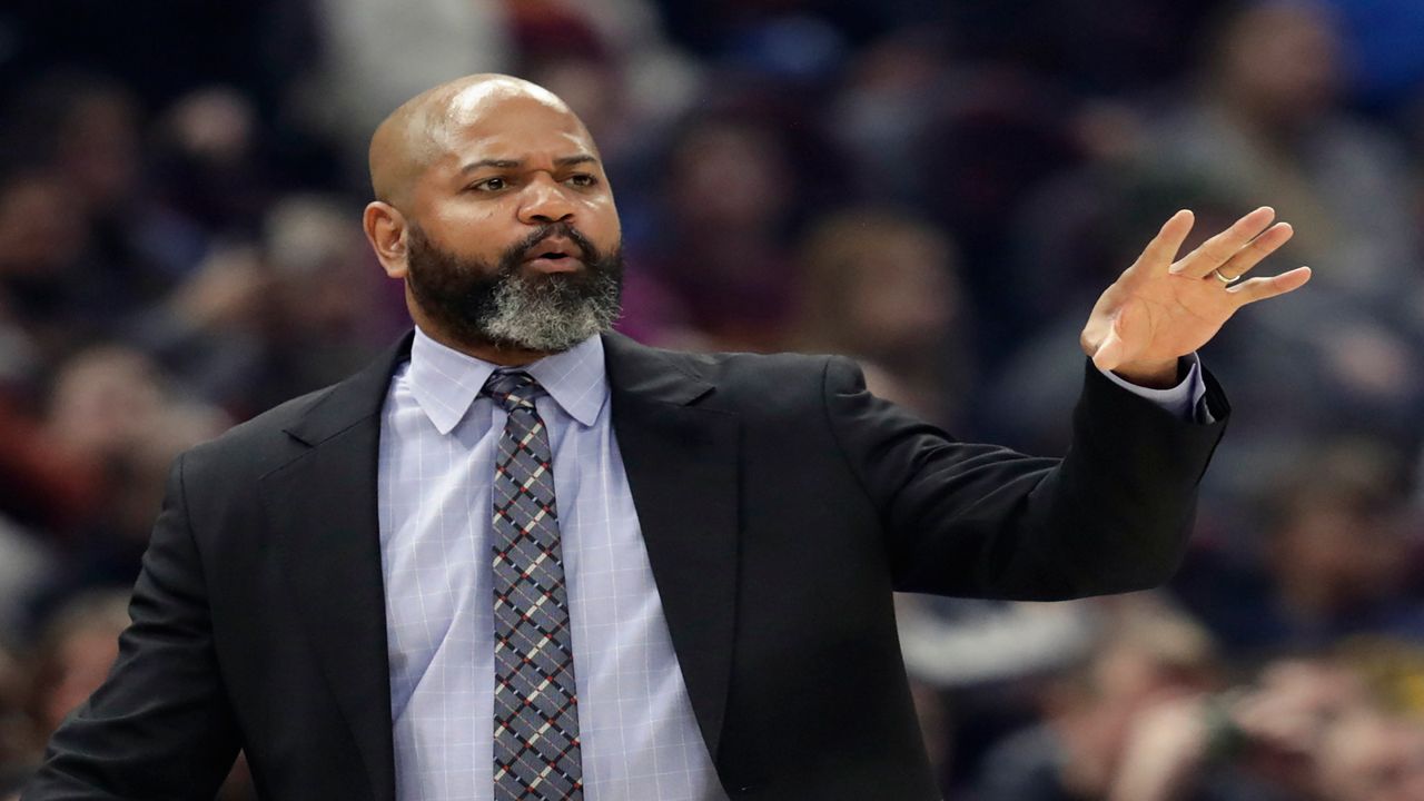 In this March 2, 2020, file photo, Cleveland Cavaliers head coach J.B. Bickerstaff gives instructions to players in the first half of an NBA basketball game against the Utah Jazz in Cleveland. (AP Photo/Tony Dejak)