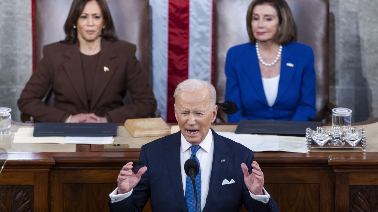 President Joe Biden delivers his first State of the Union address to a joint session of Congress at the Capitol, Tuesday, March 1, 2022, in Washington as Vice President Kamala Harris and House speaker Nancy Pelosi of Calif., look on. (Jim Lo Scalzo/Pool via AP)