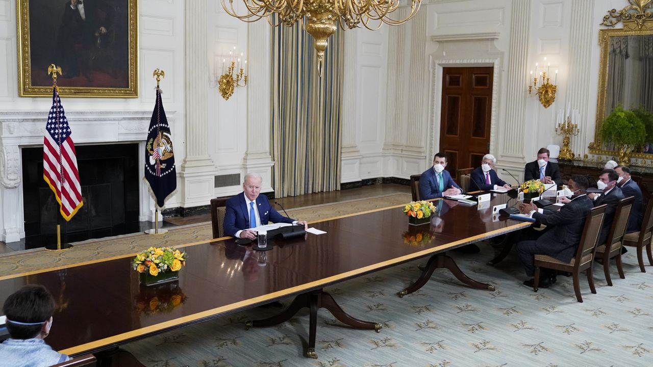 President Joe Biden speaks during a roundtable meeting with CEOs of electric utilities in the State Dining Room of the White House, Wednesday, Feb. 9, 2022, in Washington. (AP Photo/Patrick Semansky)