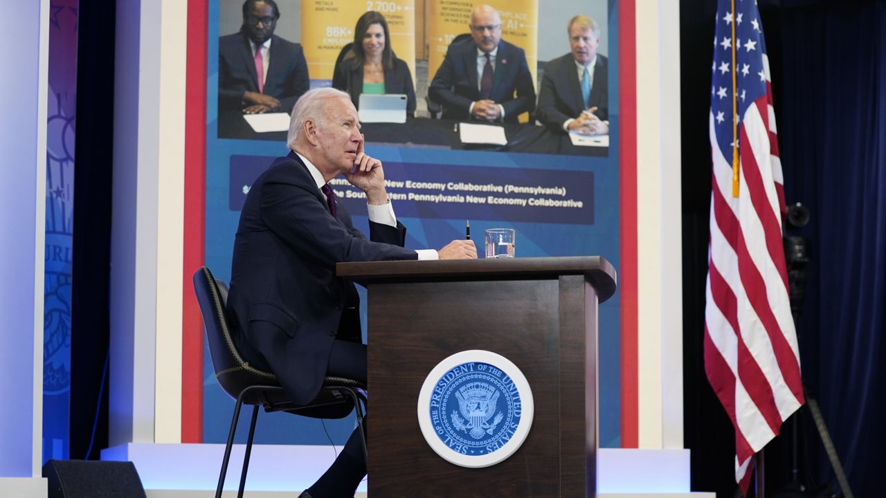President Joe Biden listens during an event on the American Rescue Plan in the South Court Auditorium on the White House campus, Friday, Sept. 2, 2022, in Washington. (AP Photo/Evan Vucci)