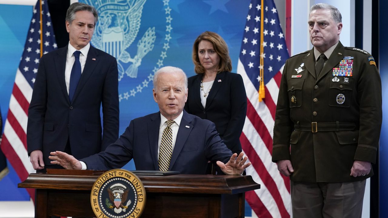 President Joe Biden speaks after signing a delegation of authority in the South Court Auditorium on the White House campus in Washington, Wednesday, March 16, 2022. (AP Photo/Patrick Semansky)