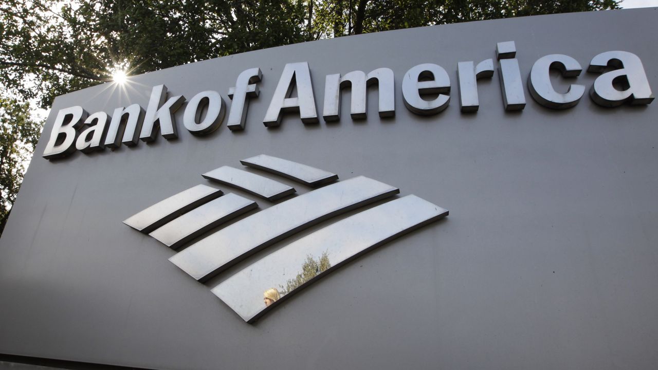 FILE - A Bank of America logo is displayed at a branch office in Palo Alto, Calif., Monday, Sept. 12, 2011. Bank of America says, Wednesday, Aug. 17, 2022, the revenue it gets from overdrafts has dropped 90% from a year ago, after the bank reduced overdraft fees to $10 from $35 and eliminated fees for bounced checks. (AP Photo/Paul Sakuma, File)