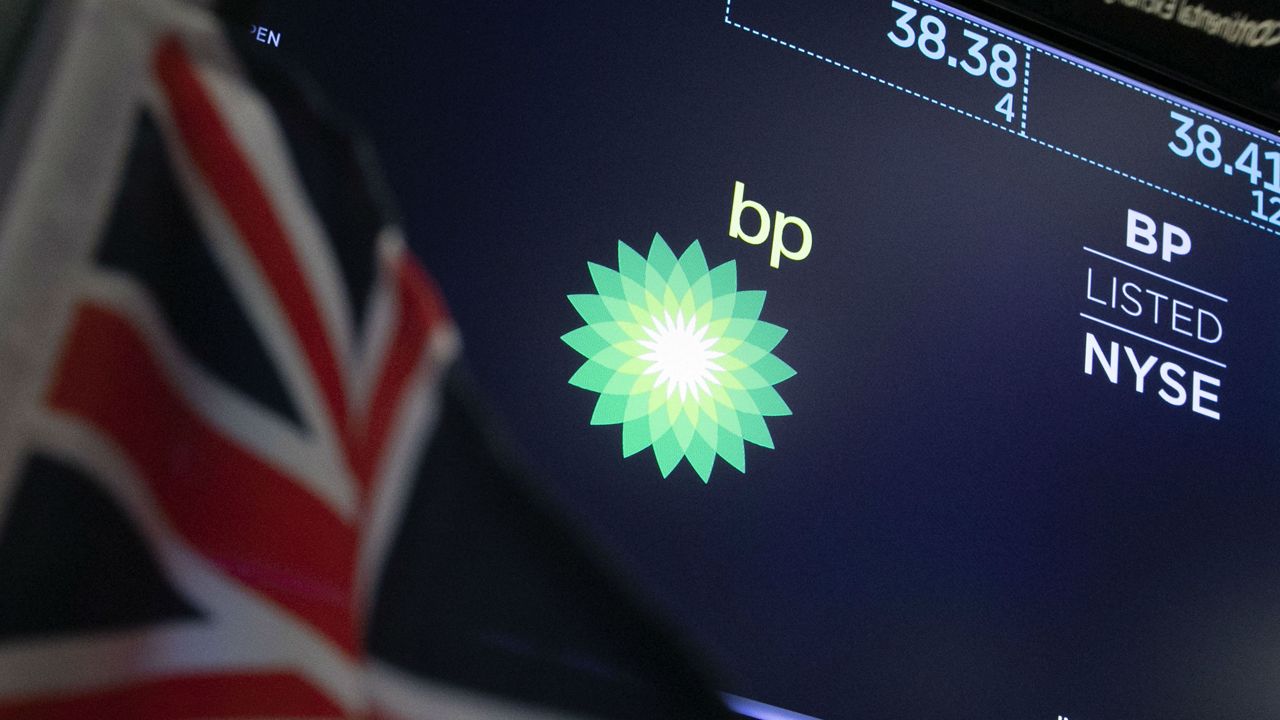 FILE - The logo for BP appears above a trading post on the floor of the New York Stock Exchange, Tuesday, Oct. 29, 2019. (AP Photo/Richard Drew)