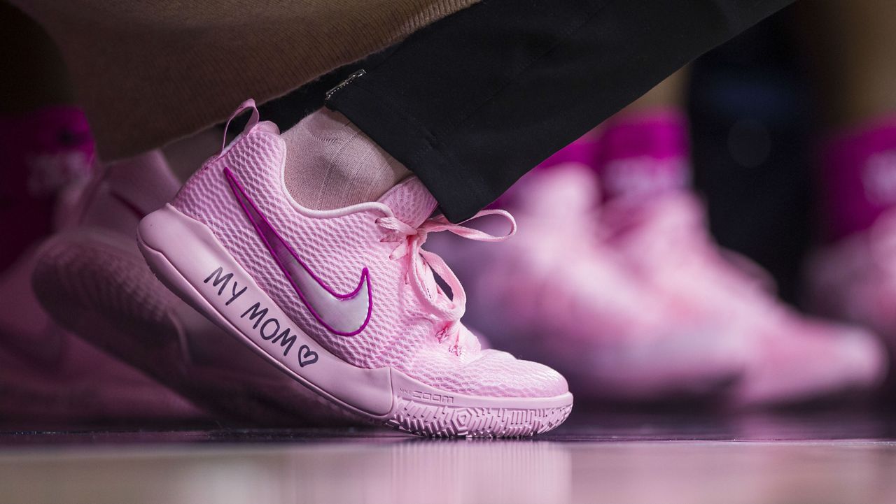 FILE - Georgia Tech head coach MaChelle Joseph wears pink shoes with handwriting that read's "My Mom" along the sole as teams wear pink for breast cancer awareness during an NCAA college basketball game against Notre Dame, Sunday, Feb. 11, 2018, in South Bend, Ind. (AP Photo/Robert Franklin)