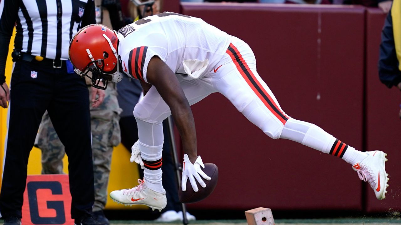 Cleveland Browns wide receiver Amari Cooper (2) knocks the pylon over as he scores a second-half touchdown against the Washington Commanders on Sunday in Landover, Md. (AP Photo/Patrick Semansky)