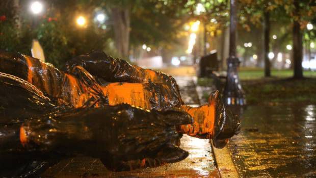 This statue of former President Theodore Roosevelt was torn down during a protest in Portland, Oregon, on Sunday night. (Sean Meagher/The Oregonian via AP)