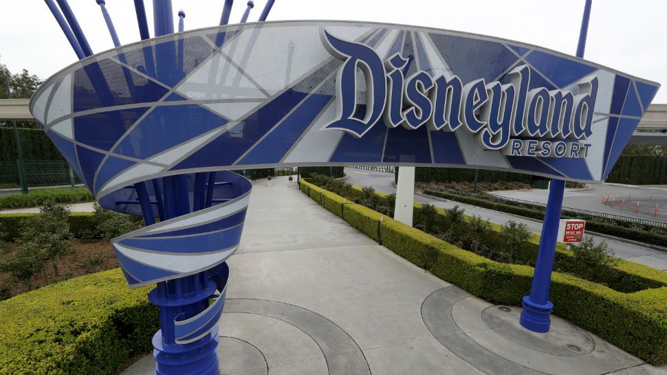 In this photo taken Wednesday, March 18, 2020, one of the normally bustling entrances to the Disneyland resort is vacant due to the coronavirus closure in Anaheim, Calif. The coronavirus is hitting California's most famous tourist sites hard. From Disneyland to Yosemite National Park, the Golden State's iconic destinations are closed or shuttering amenities to prevent the spread of the pandemic. (AP Photo/Chris Carlson)