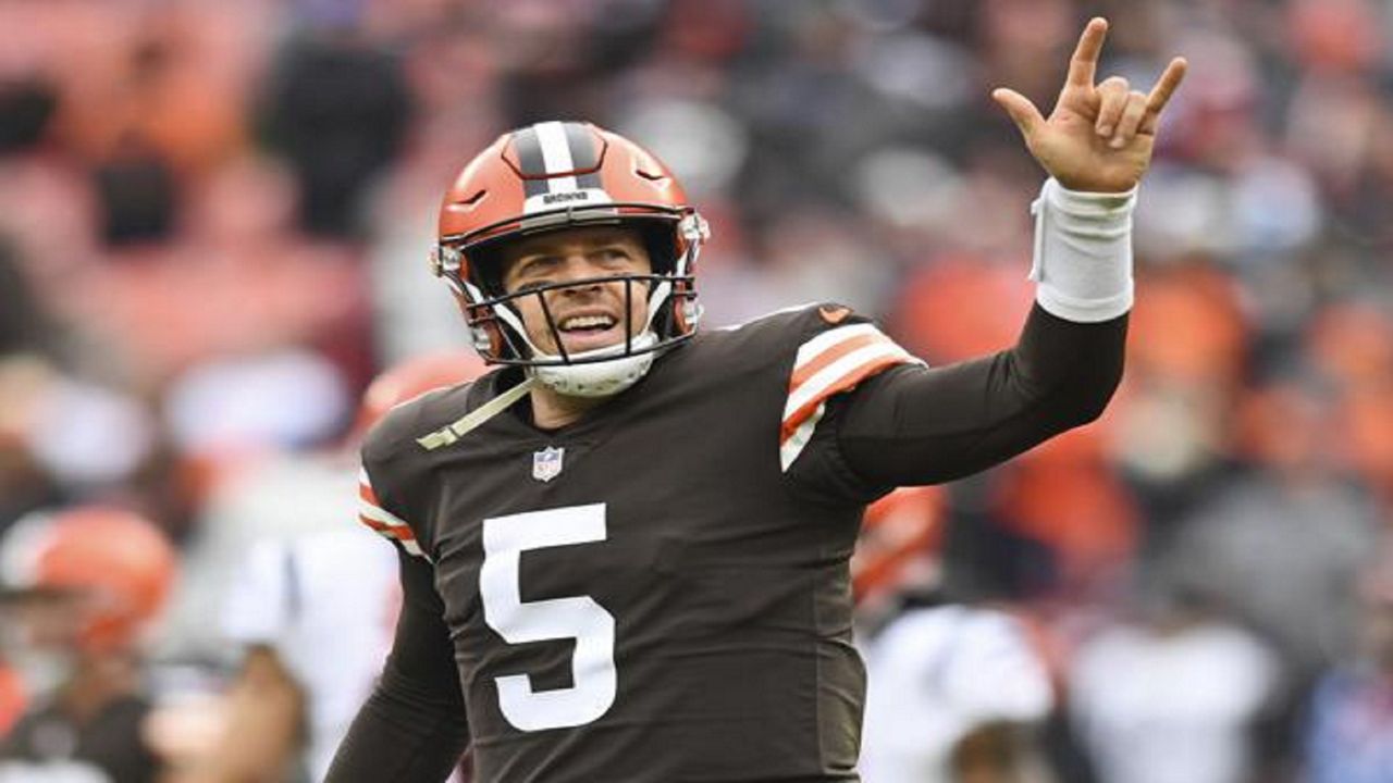 Cleveland Browns quarterback Case Keenum celebrates after a 26-yard touchdown pass to wide receiver Jarvis Landry (80) during the first half of an NFL football game against the Cincinnati Bengals, Sunday, Jan. 9, 2022, in Cleveland. (AP Photo/Nick Cammett)