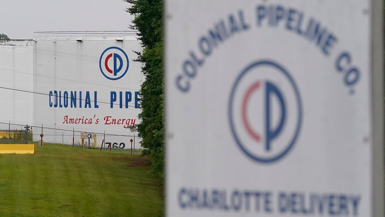 FILE - In this May 12, 2021, file photo, the entrance of Colonial Pipeline Company in Charlotte, N.C. U.S. pipeline operators will be required for the first time to conduct a cybersecurity assessment under a Biden administration directive to be issued Thursday in response to the ransomware hack that disrupted gas supplies in several states this month. (AP Photo/Chris Carlson, File)
