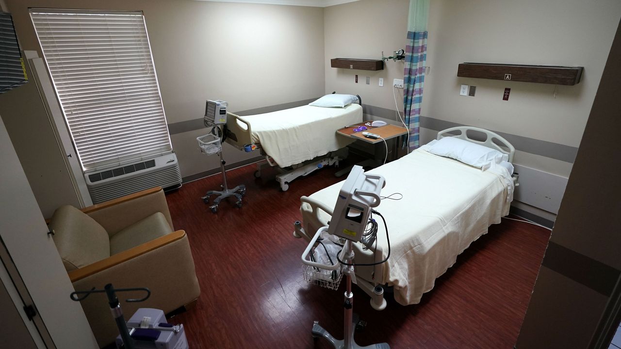 Hospital beds inside the COVID-19 wing at United Memorial Medical Center on Thursday, July 16, 2020, in Houston. (AP Photo/David J. Phillip)