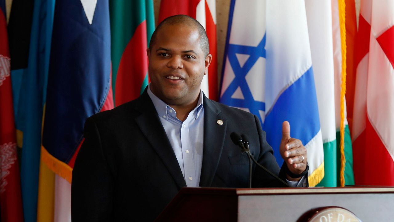 Dallas Mayor Eric Johnson responds to a question during a news conference at City Hall in Dallas. (AP Photo/Tony Gutierrez)