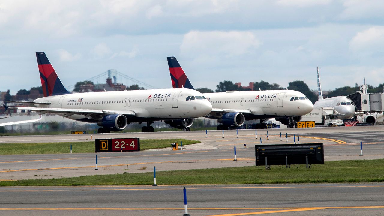 Delta Air Lines airplanes line the tarmac at LaGuardia Airport in Queens on Aug. 8, 2017.