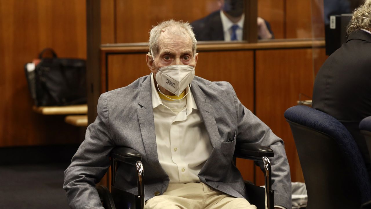 FILE: Robert Durst in his wheelchair spins in place as he looks at people in the courtroom as he appears in a courtroom in Inglewood, Calif. on Wednesday, Sept. 8, 2021, with his attorneys for closing arguments presented by the prosecution in the murder trial of the New York real estate scion who is charged with the longtime friend Susan Berman's killing in Benedict Canyon just before Christmas Eve 2000. (Al Seib/Los Angeles Times via AP, Pool)