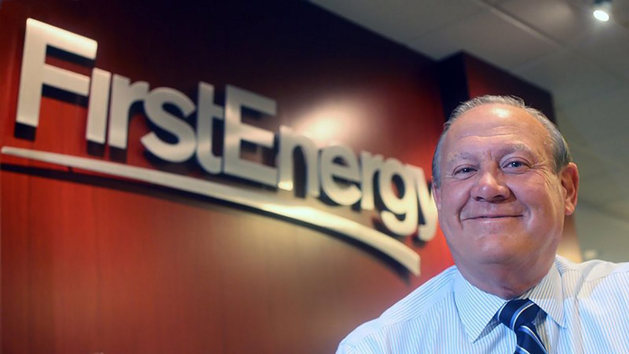 FILE - In this 2015 file photo, FirstEnergy Corp. President and CEO Charles "Chuck" Jones appears at the company's Akron, Ohio headquarters. Akron-based FirstEnergy Corp. has long maintained it had no financial stake in getting out of the business of operating nuclear power plants. But federal authorities say FirstEnergy bankrolled a $60 million bribery scheme aimed at getting the bailout approved in the Ohio Legislature. (Phil Masturzo//Akron Beacon Journal via AP, File)