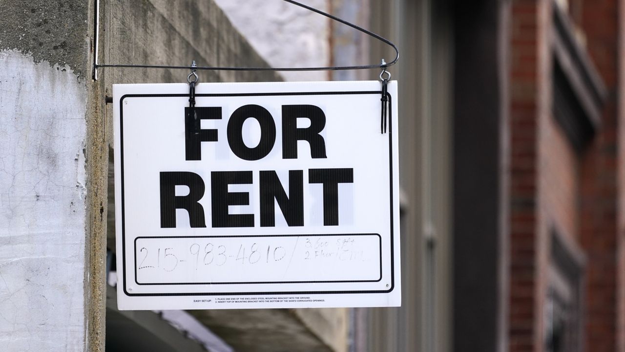 FILE: A for rent sign is posted on a building in Philadelphia, Tuesday, Jan. 18, 2022. (AP Photo/Matt Rourke)