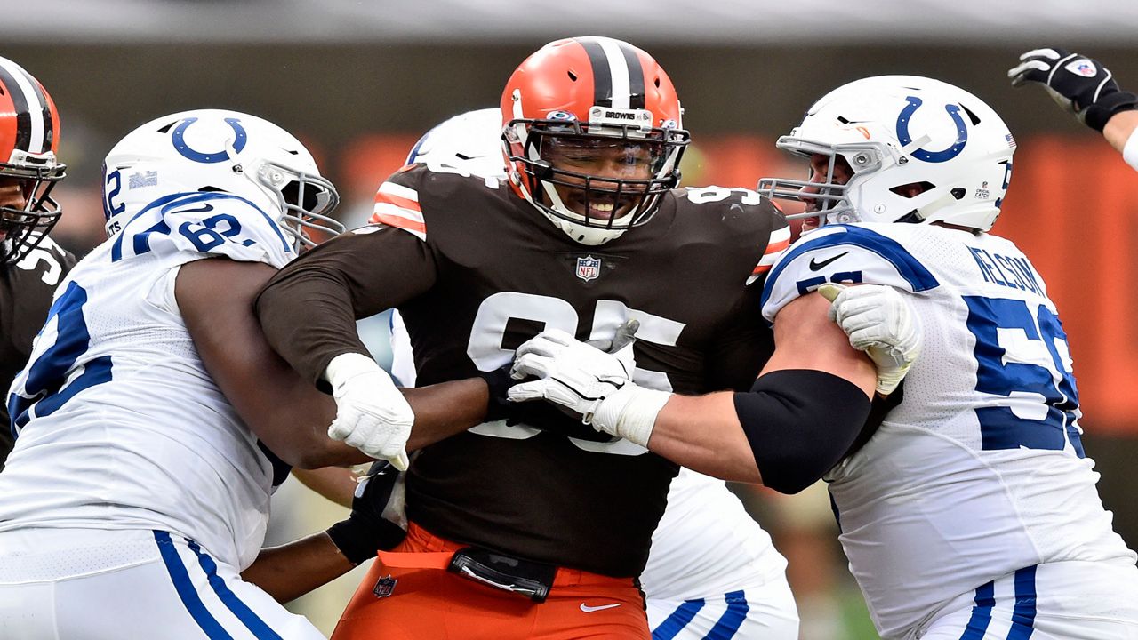 Myles Garrett, Cleveland's defense devour Titans, Deshaun Watson has 2 TD  passes in Browns' 27-3 win