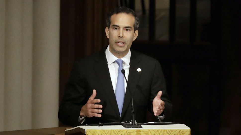 FILE - In this Dec. 6, 2018 file photo, George P. Bush pauses as he gives a eulogy during a funeral for former President George H.W. Bush at St. Martin's Episcopal Church, in Houston. Bush condemned racism in his party Thursday, Dec. 12, 2019 over what he says is now a third instance in Texas this month of "racist or hateful rhetoric," the latest being a Facebook post that he suspects targets his own Hispanic family. (AP Photo/Mark Humphrey, File)