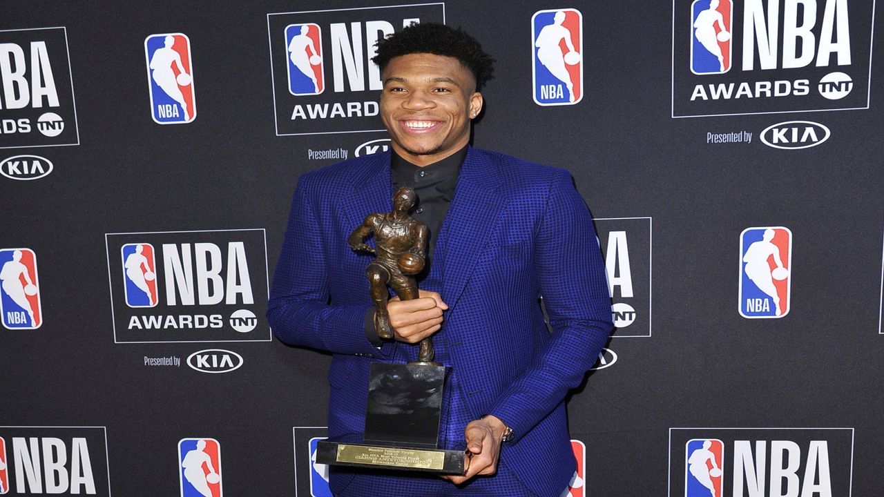 Milwaukee Bucks' Giannis Antetokounmpo (34) in the second half of an NBA conference semifinal playoff basketball game against the Miami Heat Friday, Sept. 4, 2020, in Lake Buena Vista, Fla. (AP Photo/Mark J. Terrill)