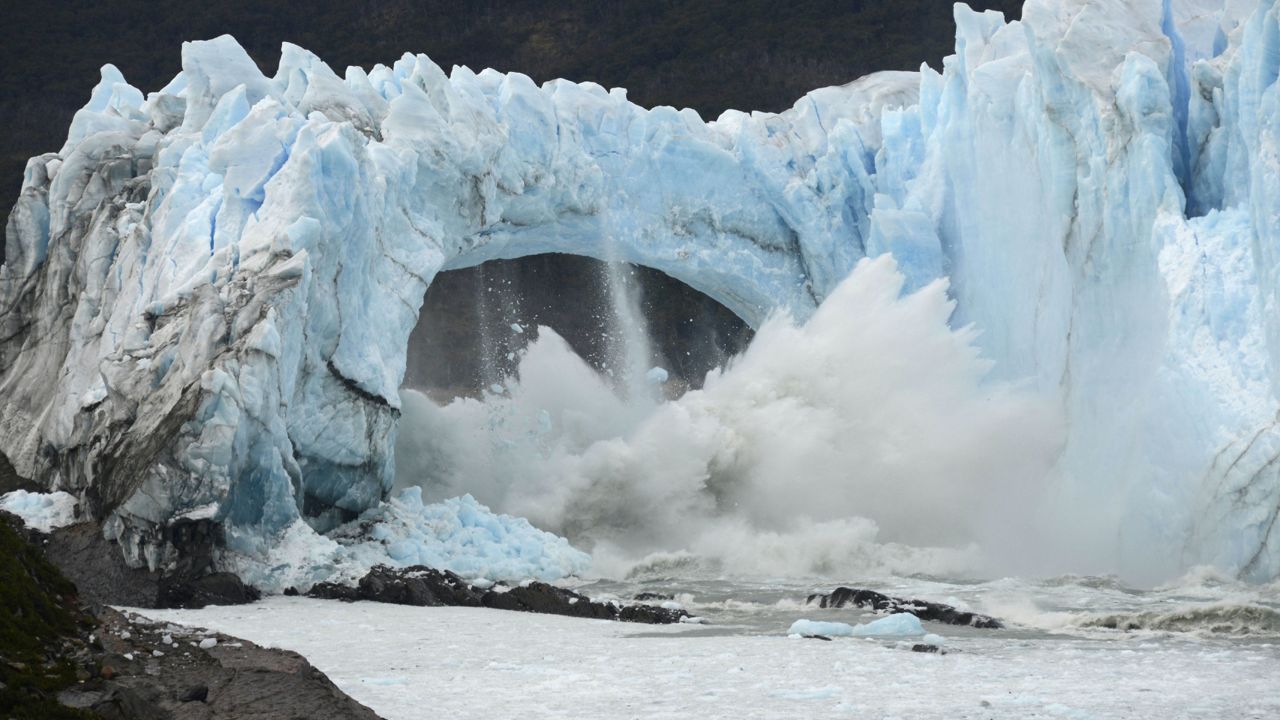 In this Thursday, March 10, 2016 photo, ice breaks off the Perito Moreno Glacier in Lake Argentina at Los Glaciares National Park near El Calafate in Argentina's Patagonia region. (AP Photo/Francisco Munoz)