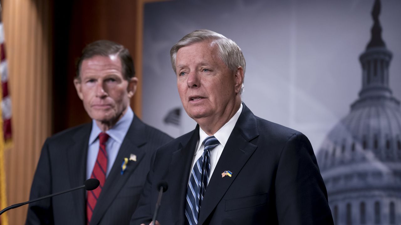 Sen. Richard Blumenthal, D-Conn., left, and Sen. Lindsey Graham, R-S.C., speak to reporters about designating Russia as a state sponsor of terrorism because of Vladimir Putin's invasion of Ukraine, at the Capitol in Washington, Tuesday, May 10, 2022. (AP Photo/J. Scott Applewhite)