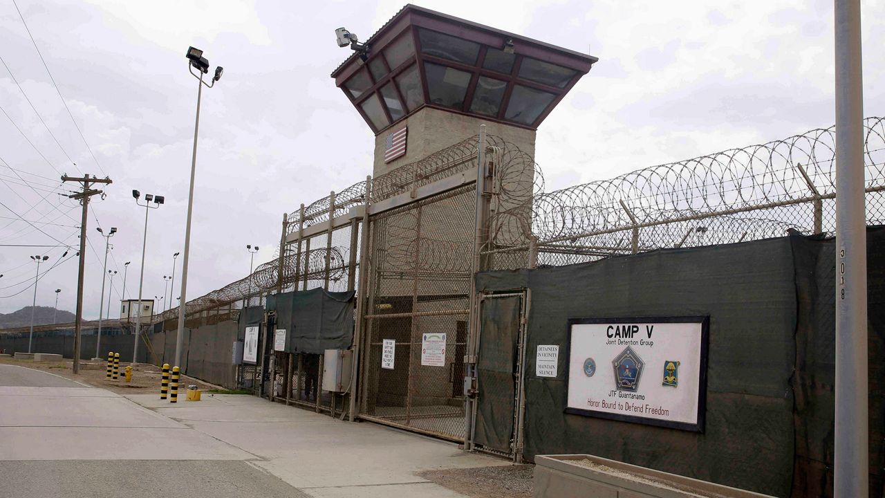 In this June 7, 2014, file photo, the entrance to Camp 5 and Camp 6 at the U.S. military's Guantanamo Bay detention center, at Guantanamo Bay Naval Base, Cuba. (AP Photo/Ben Fox, File)