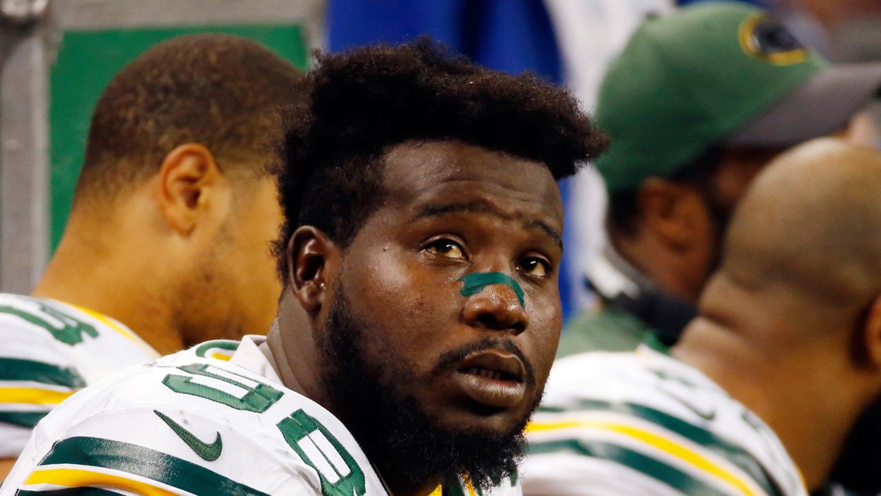 Ex-Packer Guion gets 1 year for domestic violence assault