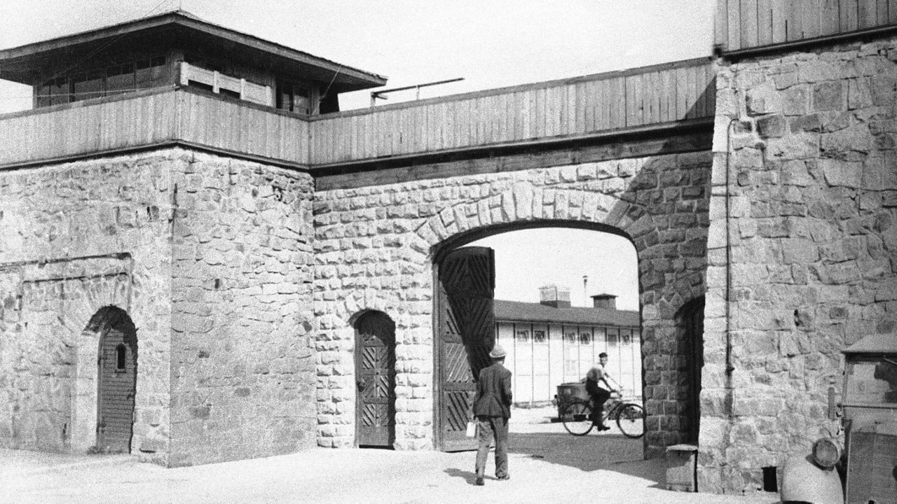 FILE -- In this July 1945 file photo the main gate is pictured at the Mauthausen Concentration Camp, near Linz, Austria. The concentration camp was liberated by U.S. troops on May 5, 1945. (AP Photo/Lynn Heinzerling, file)