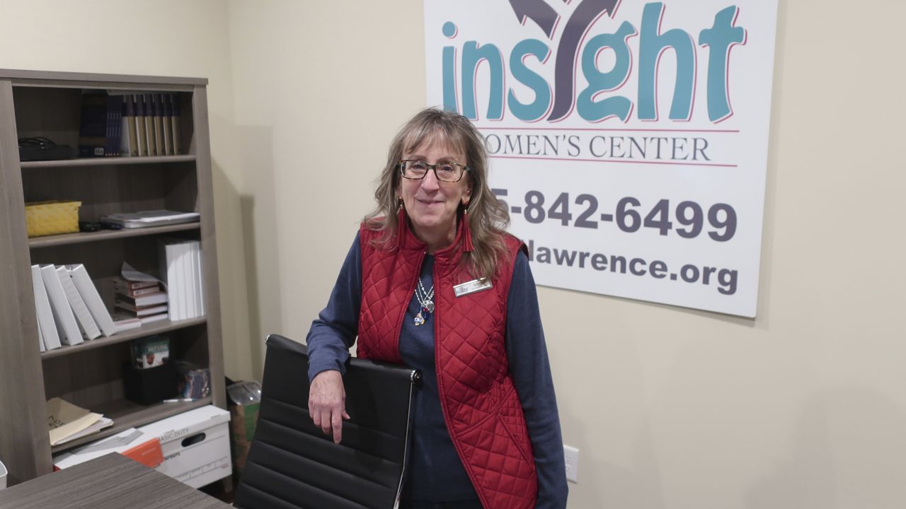 Bridgit Smith, executive director of the Insight Women's Center, pauses while discussing the center's services for pregnant women and new parents, Tuesday, Jan. 31, 2023, in Lawrence, Kan. (AP Photo/John Hanna)
