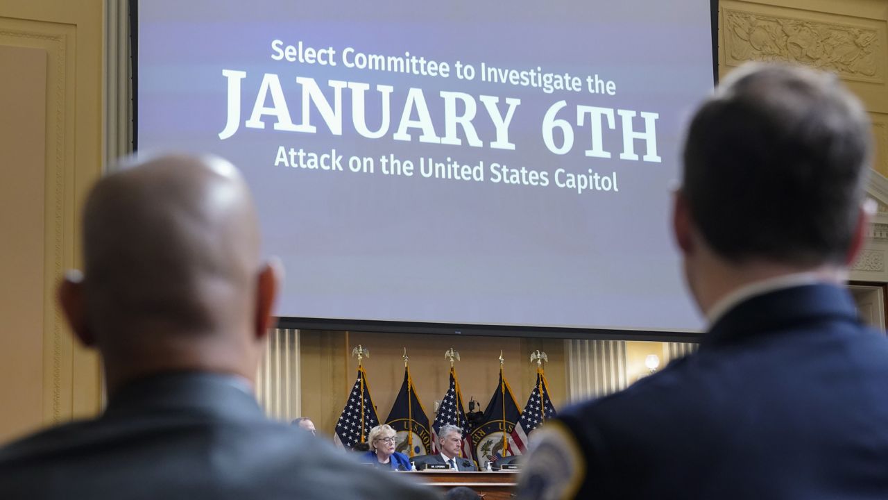 U.S. Capitol Police Sgt. Aquilino Gonell, left, and Washington Metropolitan Police Department officer Daniel Hodges listen as the House select committee investigating the Jan. 6 attack on the U.S. Capitol holds a hearing on Capitol Hill in Washington, Thursday, Oct. 13, 2022. (AP Photo/Jacquelyn Martin)