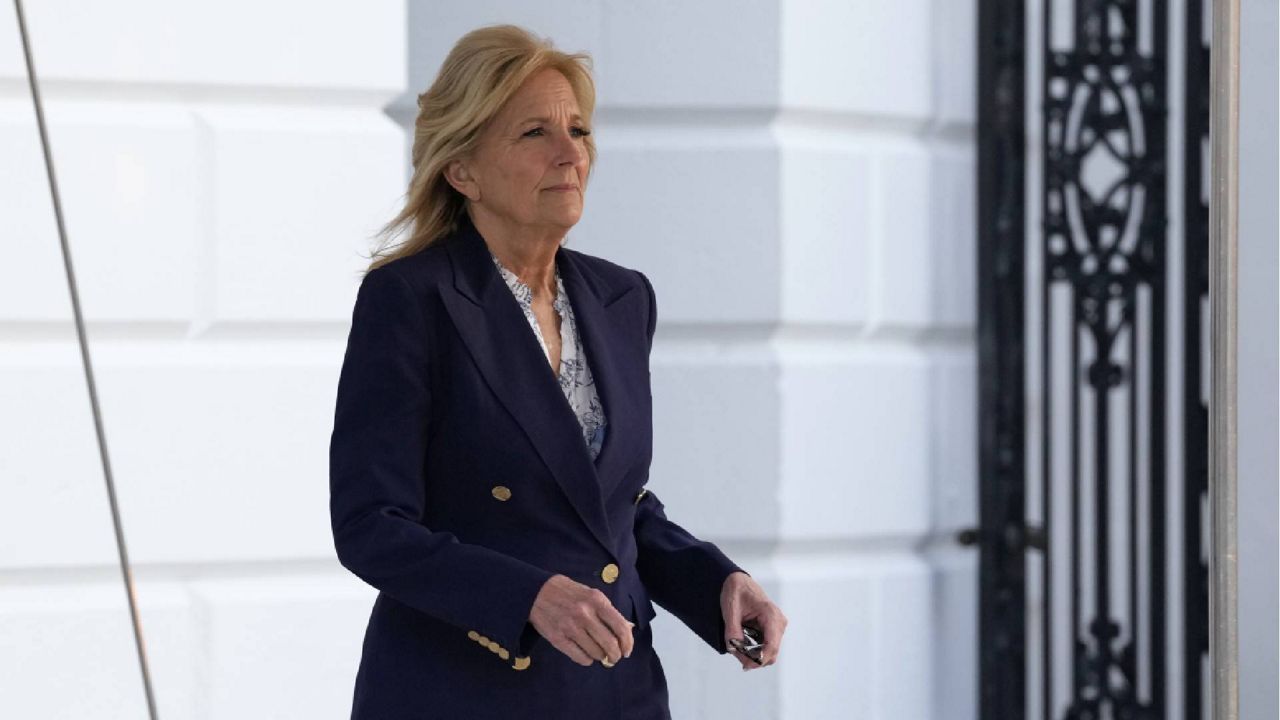 First lady Jill Biden walks out of the White House in Washington, Wednesday, Jan. 11, 2023, as she and President Joe Biden prepare to board Marine One. Jill Biden is having surgery to remove a small lesion found above her right eye during a routine skin cancer screening. (AP Photo/Susan Walsh)